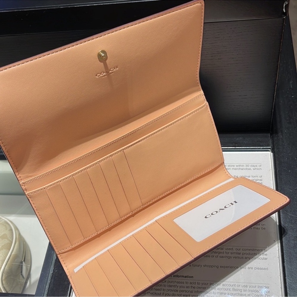 Coach Slim Trifold Wallet In Signature Canvas
IM/Light Khaki/Faded Blush - Picture 7 of 16